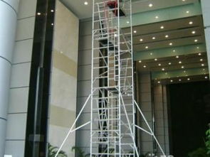 廣州租售廠房消防吊頂專用電動剪叉式液壓升降平臺與附著式升降腳手架應用指南